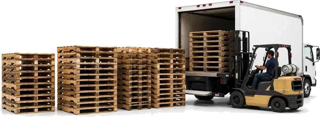LTL Recycled Pallets (48x40 Grades A & B). A few stacks (10-20 pallets each) of recycled wood pallets being delivered or staged in a warehouse, supplied by U.S. Pallet & Crate in Houston, TX