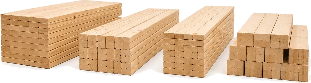 Pallet Cut Stock. A pallet workshop with neat stacks of pre-cut wood pieces — deck boards, stringers, blocks — labeled and ready to assemble, supplied by U.S. Pallet & Crate in Houston, TX